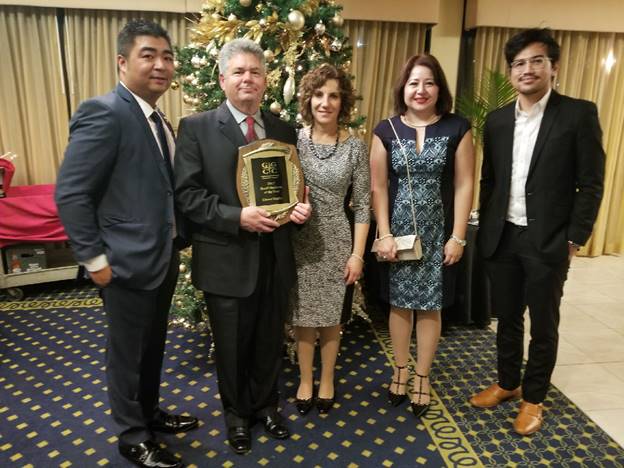 Nino Penaflor, Martin Hollander, owner, Michele Hollander, Adriana Camacho, Poundra Prayitno of Crown Trophy Gaithersburg proudly accept the Gaithersburg-Germantown Chamber’s 11th Annual Small Business of the Year Award at the Chamber’s Annual Celebration Dinner & Award Ceremony on December 7, 2017. (Photo Credit: GGCC)