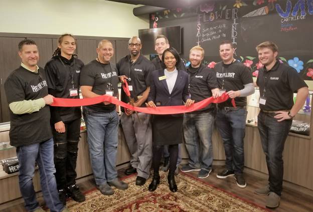 (l:r) Andy Cohen, Owner, Herbology; Stanley Herbert, Patient Consultant, Herbology; Mitch Kahn, Owner, Herbology; Melvin Crawford III, General Manager, Herbology; Tim Hartung, Assistant General Manager, Herbology; Laurie-Anne Sayles, Council Member, City of Gaithersburg; Peyton Hurst, Regional Manager, Herbology; Matt Darin, Owner, Herbology: and Brandon Smith, Regional Manager, GreenHouse at the Grand Opening of Herbology, one of the first medical cannabis dispensaries in Gaithersburg, Maryland on January 17, 2018.  (photo credit: Laura Rowles, GGCC Director of Events & Marketing)