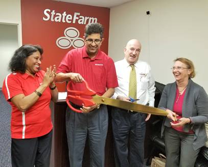 (l:r) Rajeshri Konadkar, Manager, State Farm; Manny Pohani, Owner / Licensed Agent, State Farm; Bruce Kanner, Owner, Imaging Supply Specialist, Cartridge on Wheels & Gaithersburg-Germantown Chamber Board Member; and Marilyn Balcombe, President / CEO, Gaithersburg-Germantown Chamber celebrate - with smiles and laughter - the grand opening of State Farm Insurance Pohani.  (photo credit: Laura Rowles, GGCC Director of Events & Marketing)